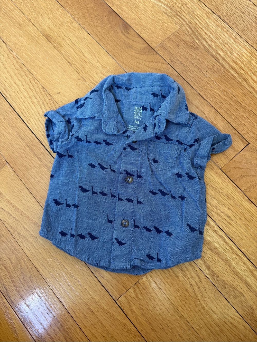 Dinosaur print button-up, newborn size